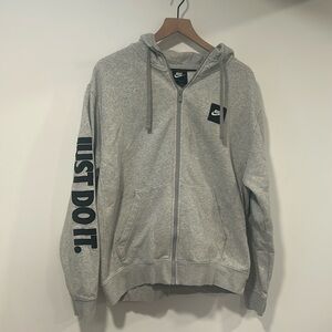 Mens Nike Light Gray Hoodie.  Just Do It logo on arm. Size Large